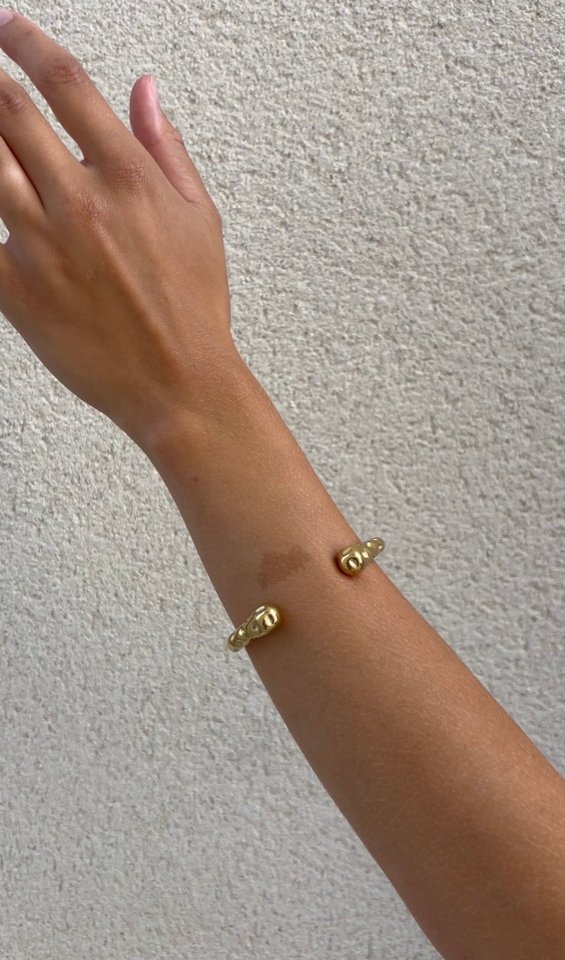 Hammered embrace bangle