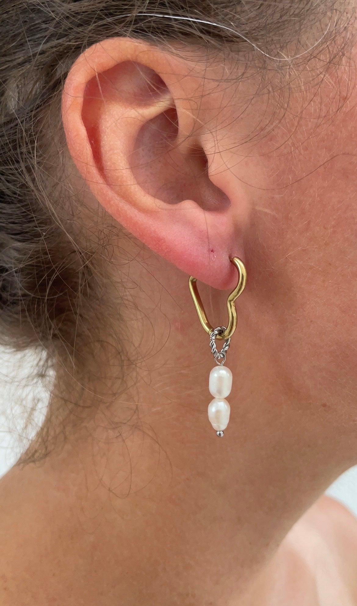 Asymetric heart earrings