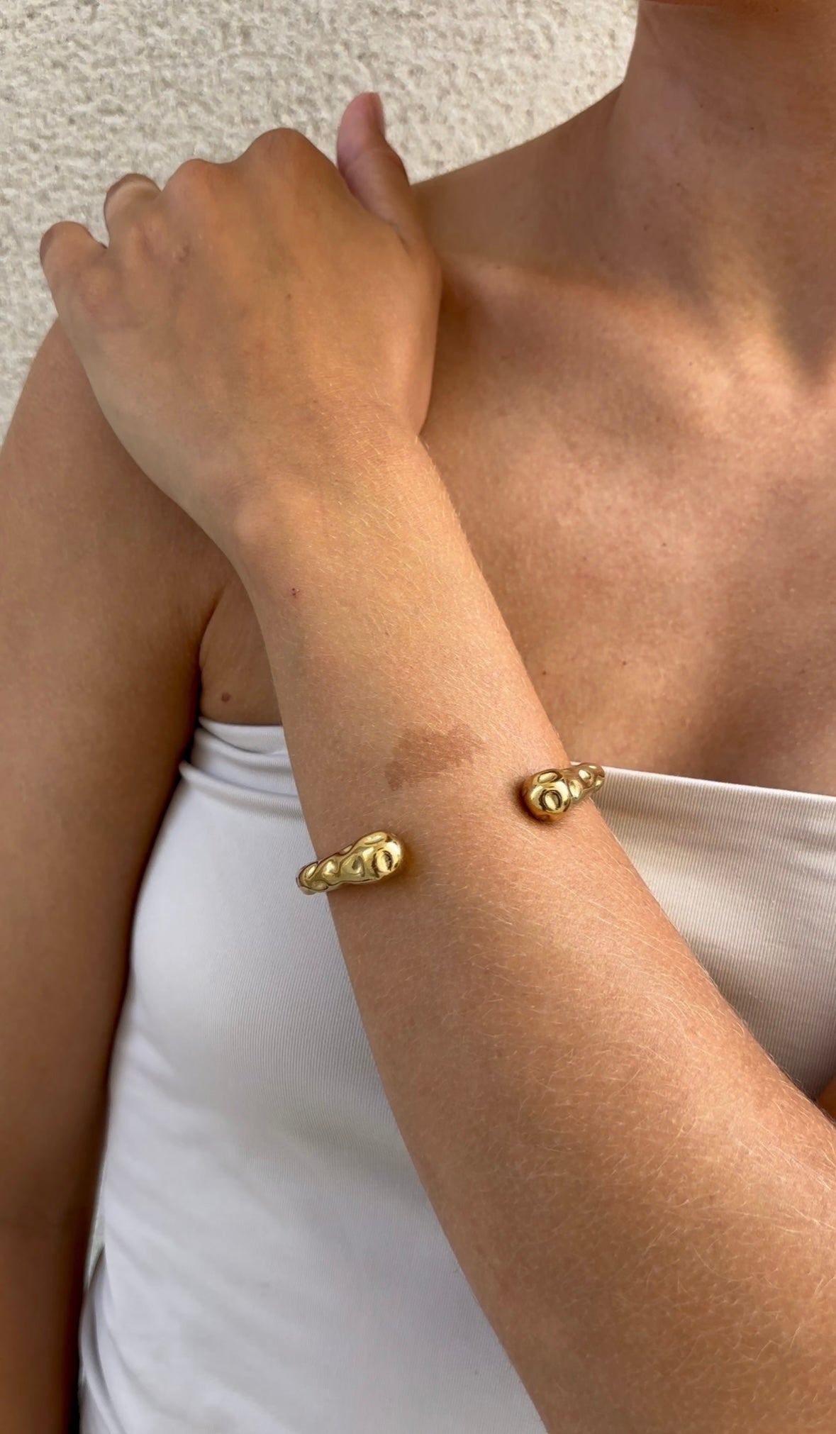 Hammered embrace bangle