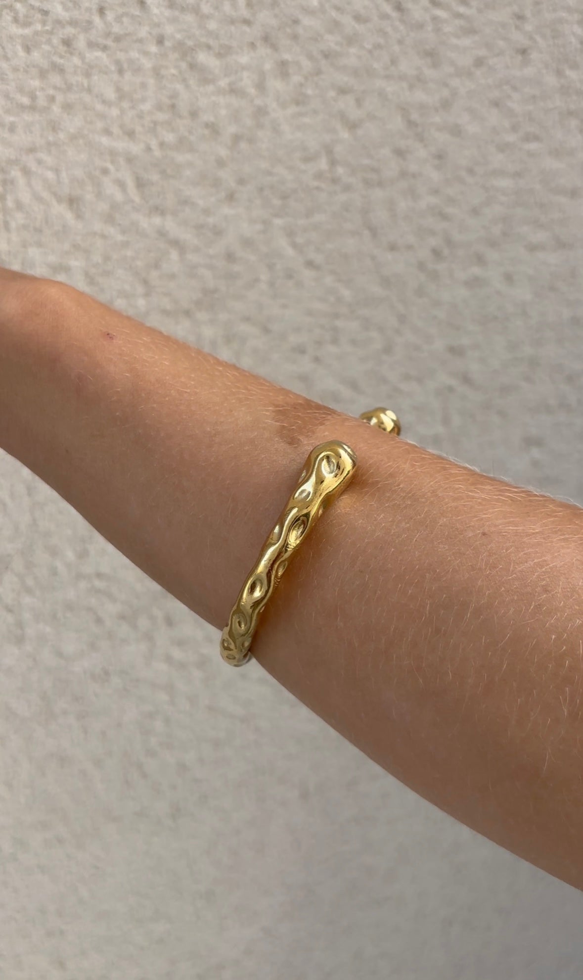Hammered embrace bangle