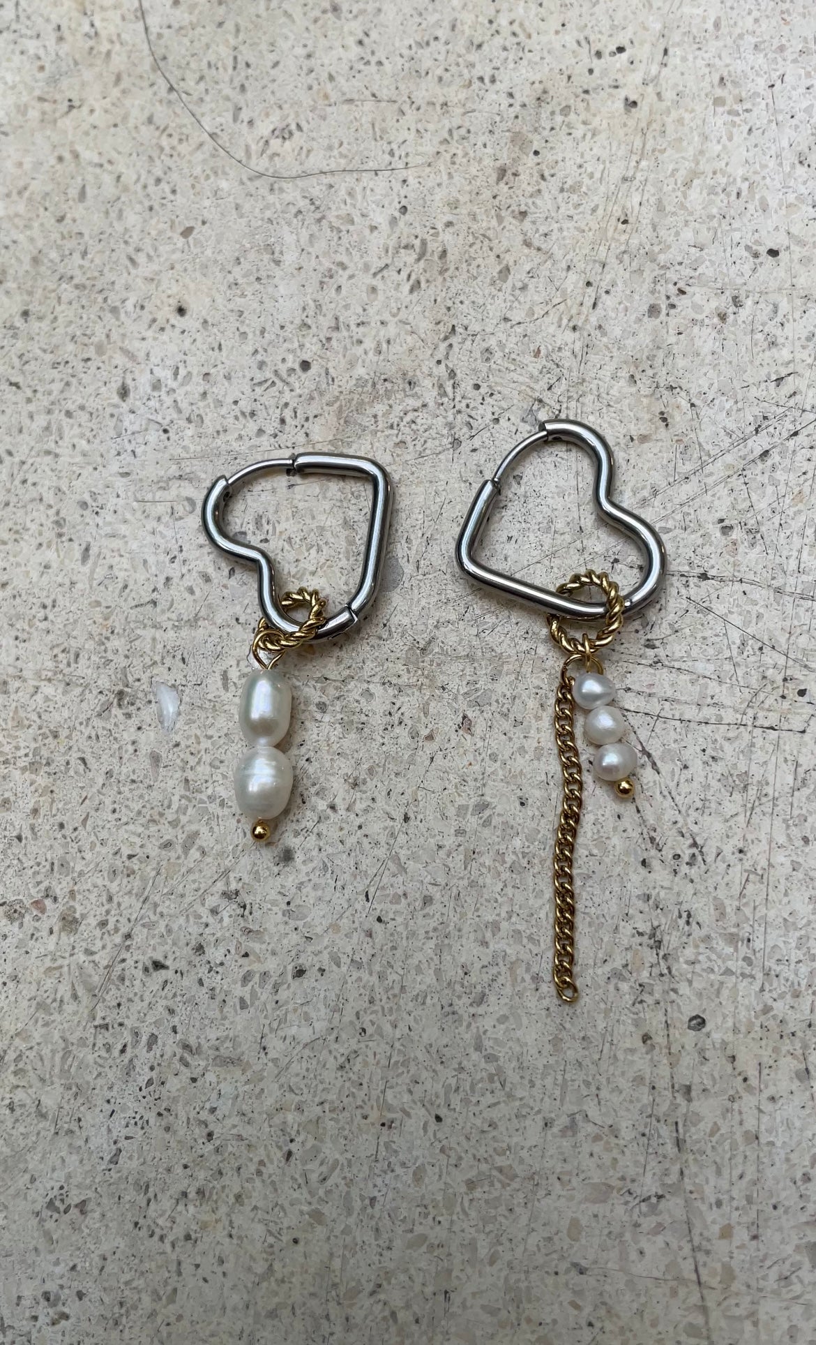 Asymetric heart earrings