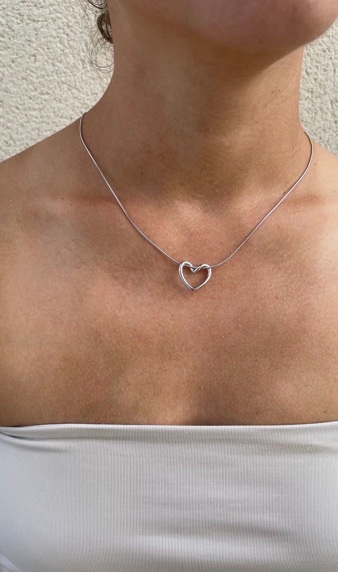 Embrace heart necklace
