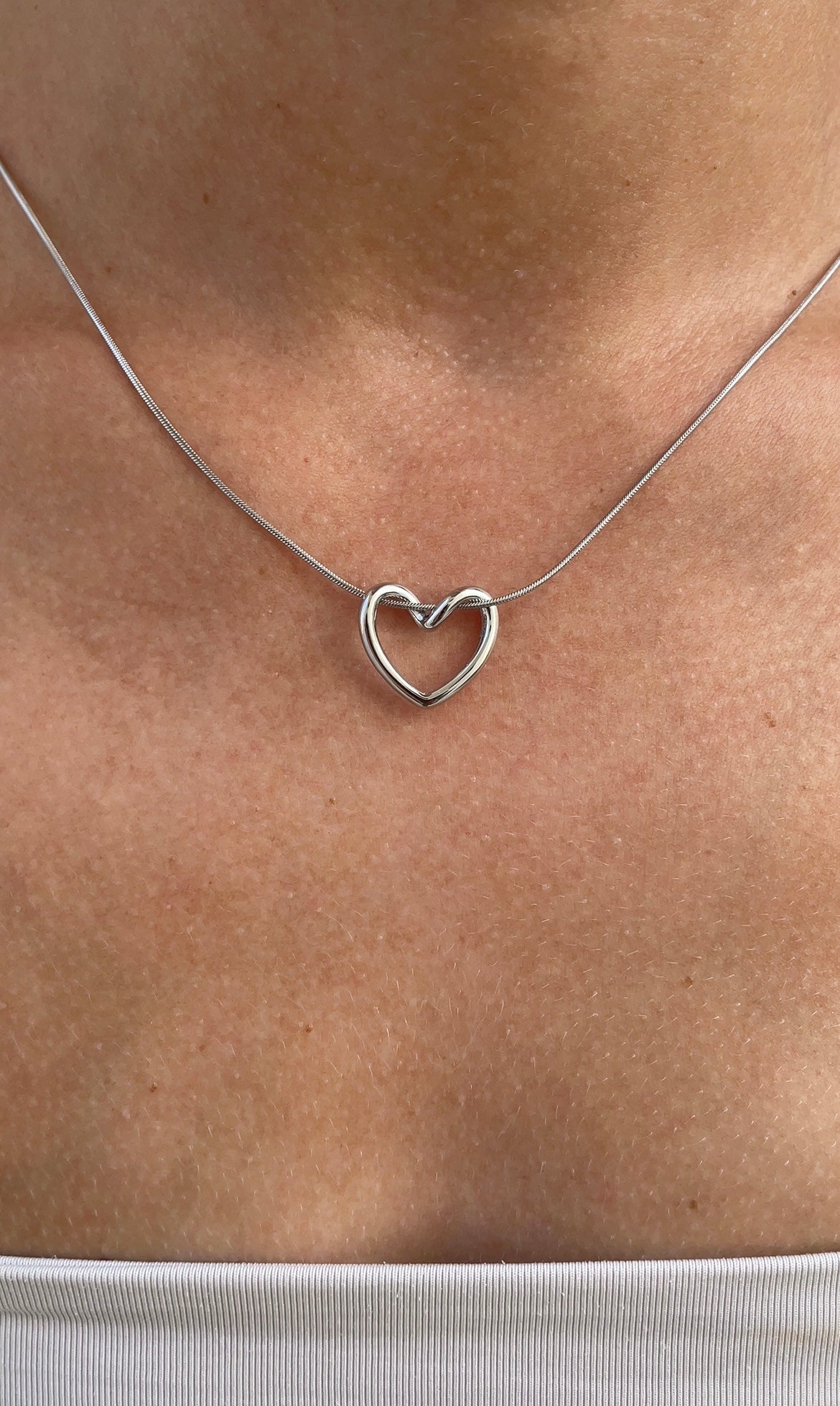 Embrace heart necklace