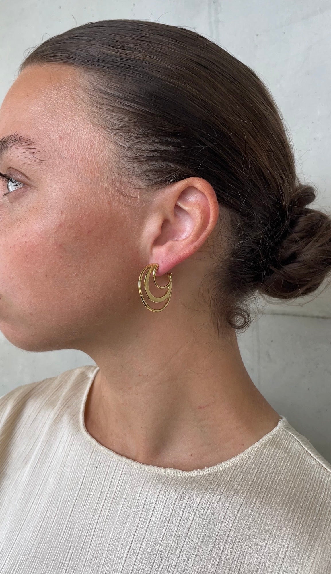 Asymmetric whirlwind earrings