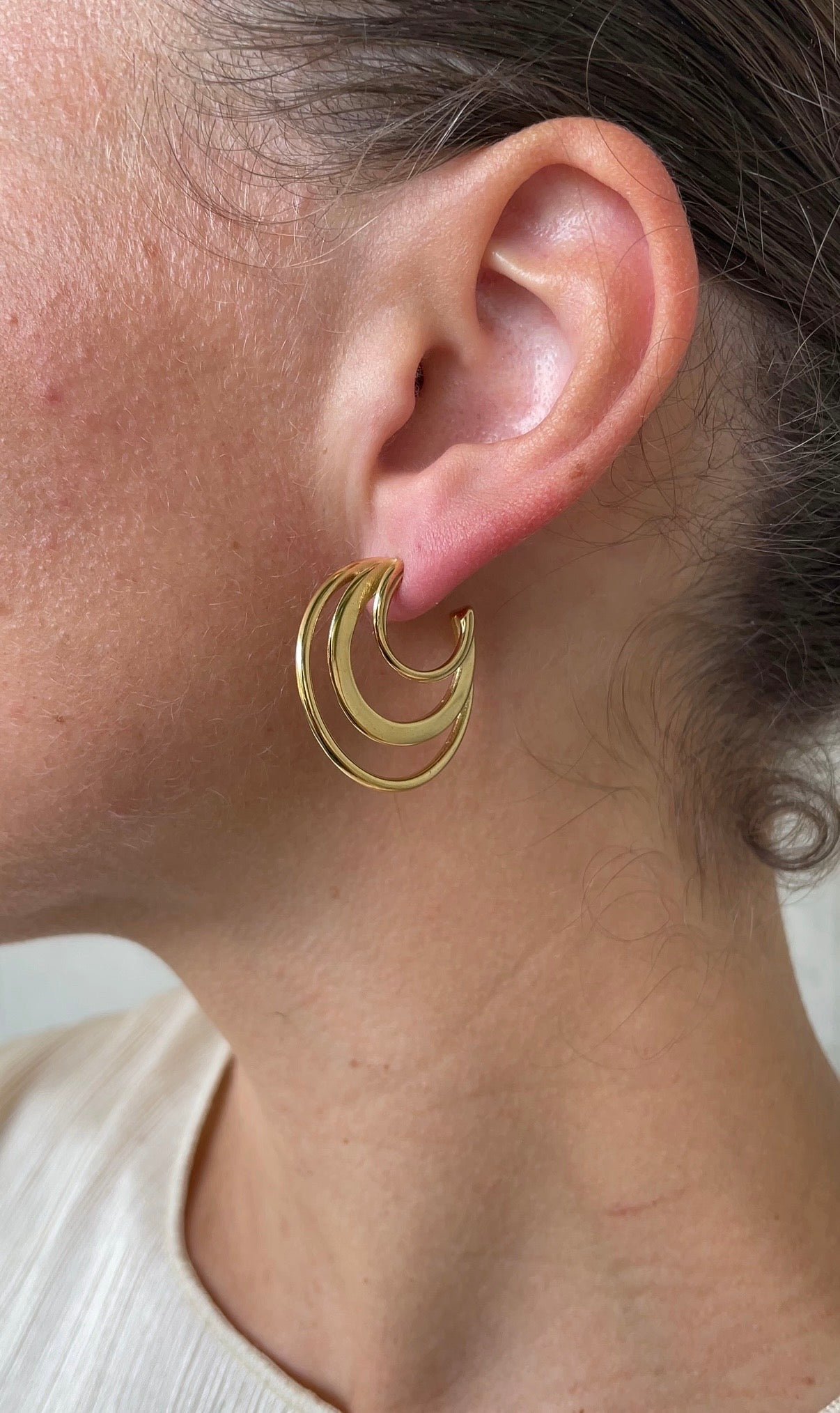 Asymmetric whirlwind earrings