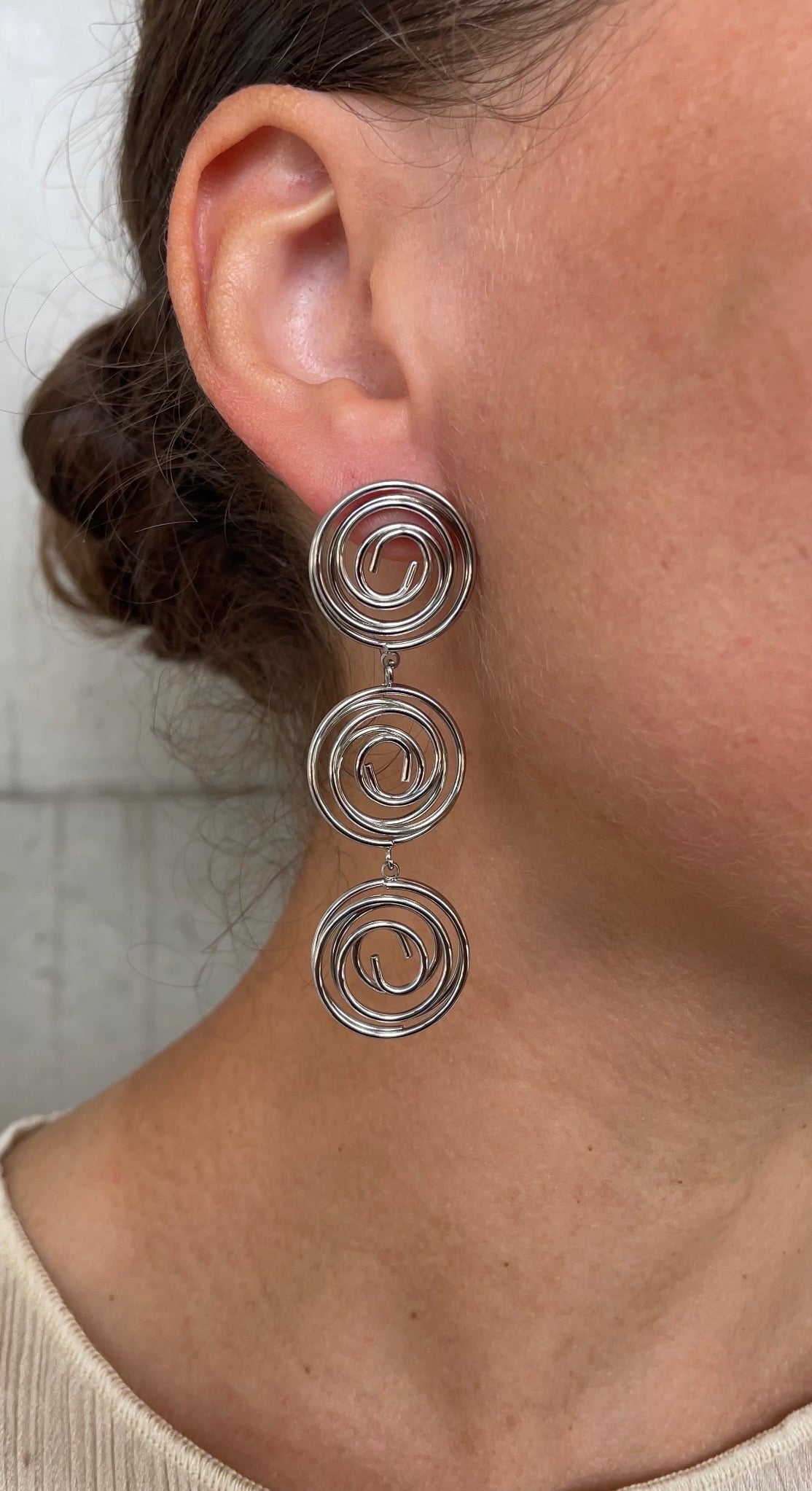 Asymmetric whirlwind earrings