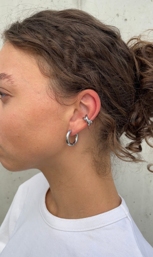 Thin cross ear cuff