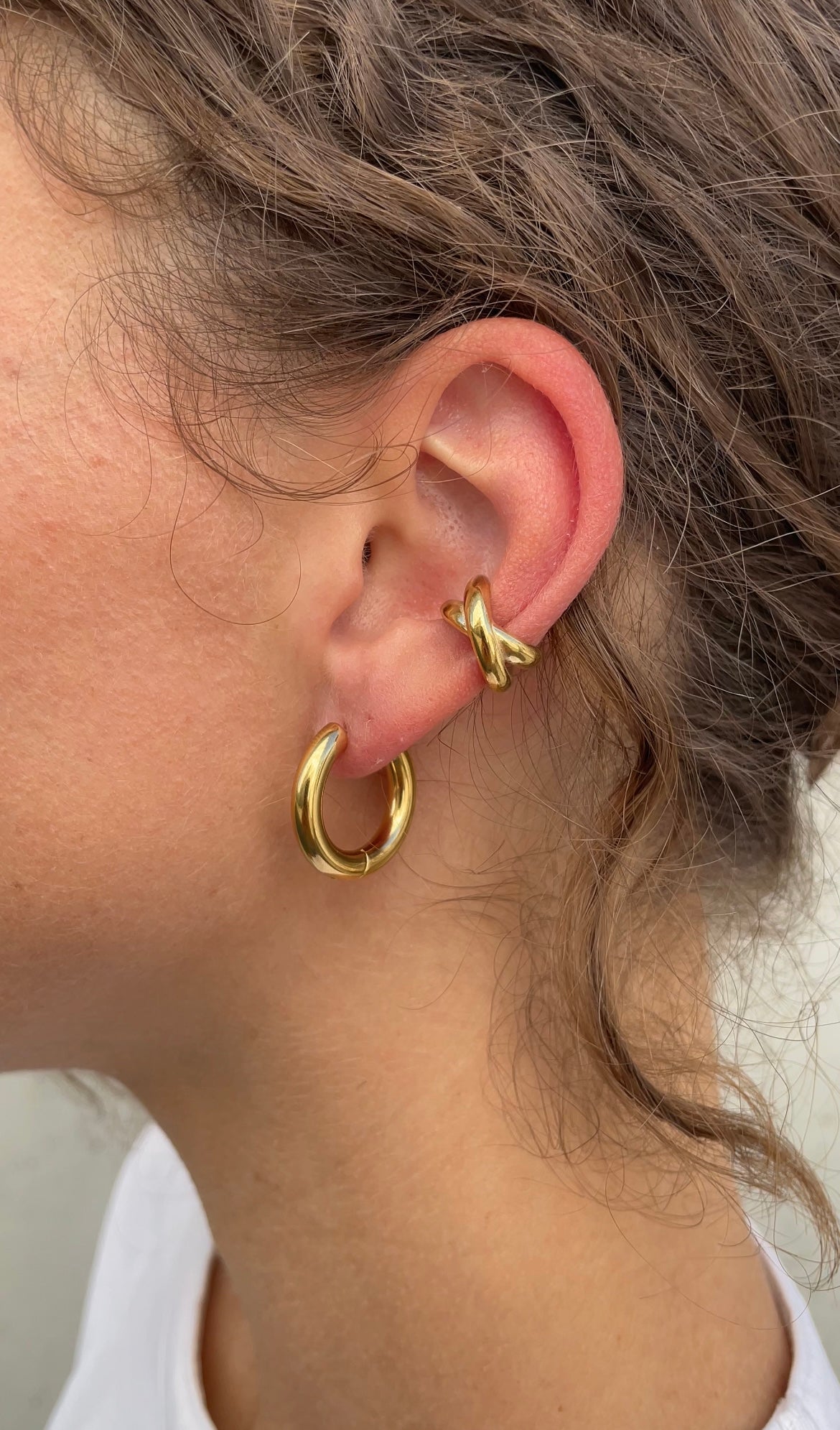 Thin cross ear cuff
