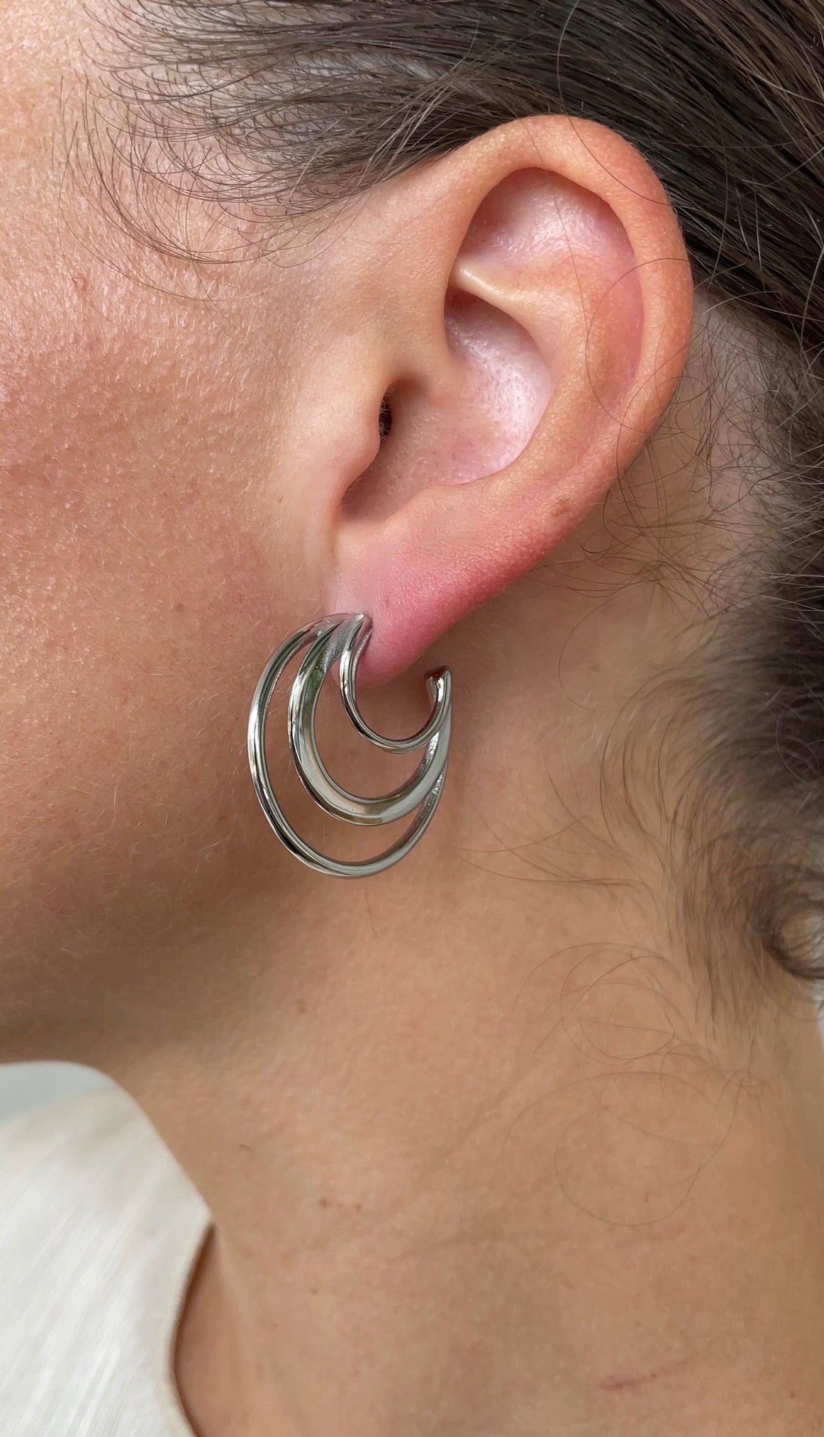 Asymmetric whirlwind earrings
