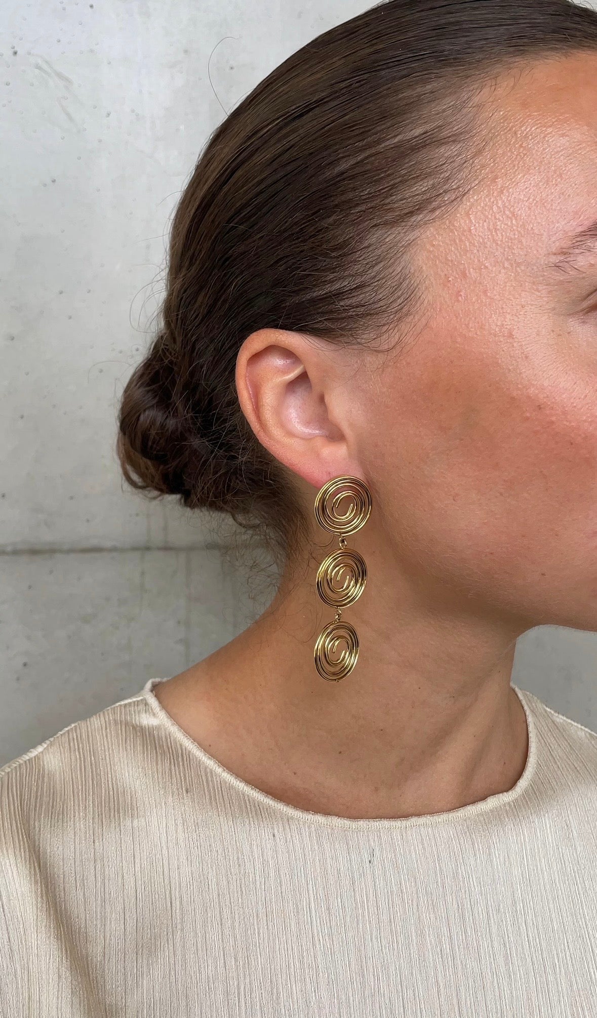Asymmetric whirlwind earrings