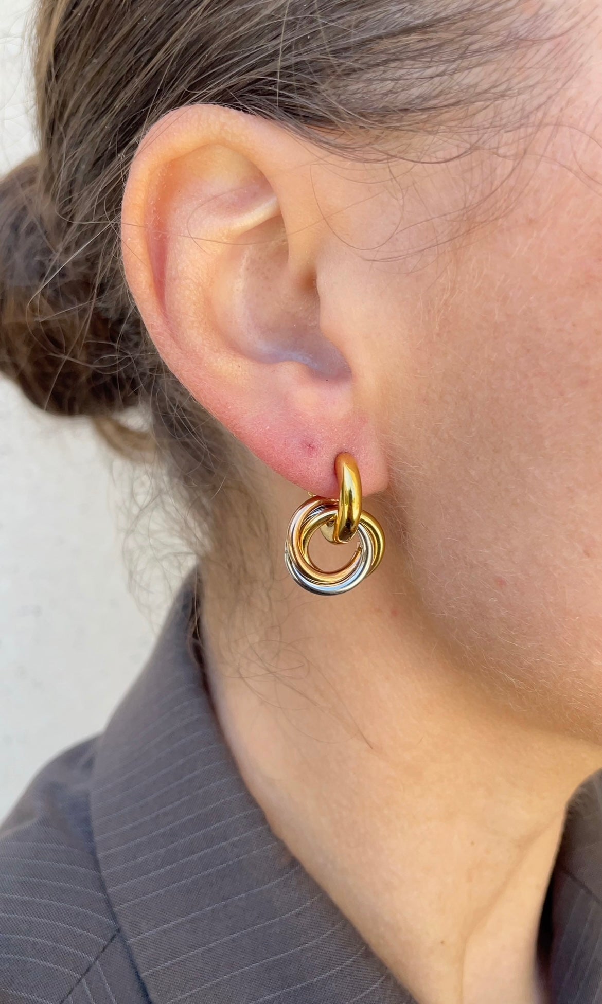 Asymmetric circle earrings