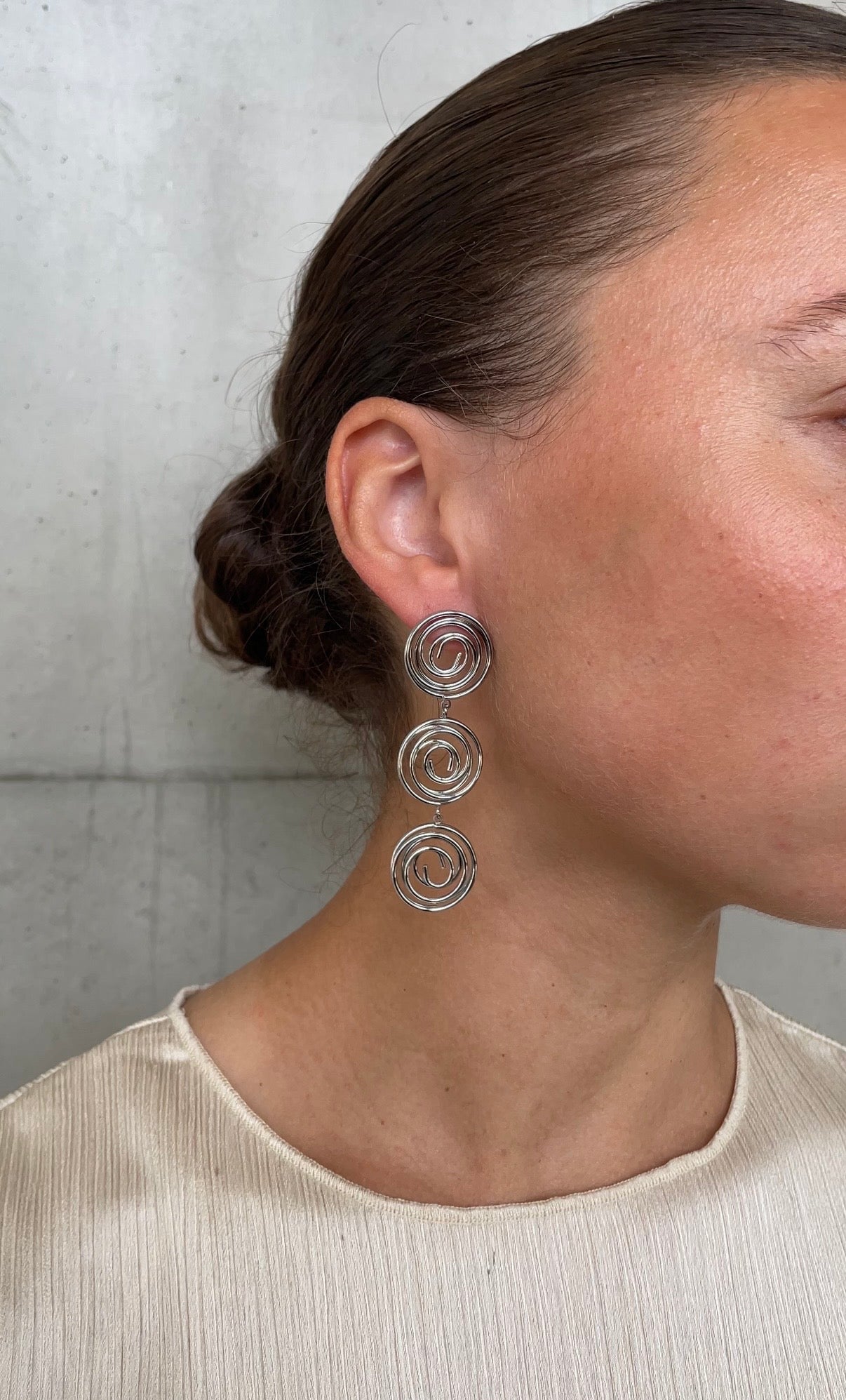Asymmetric whirlwind earrings